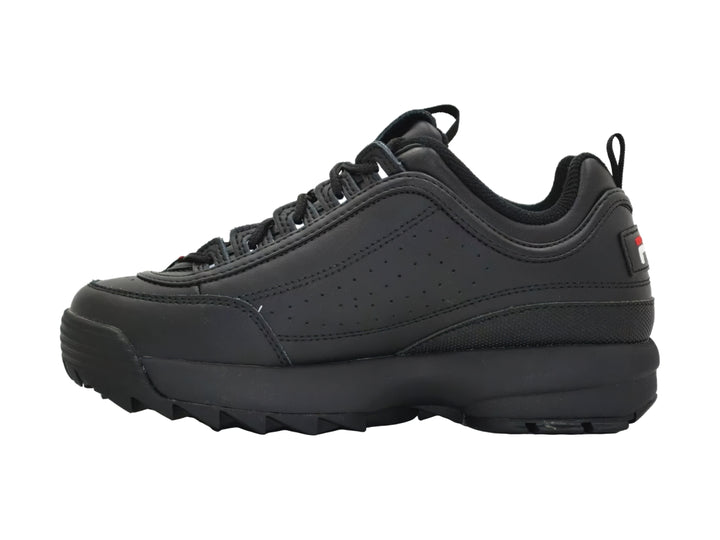 Tenis FILA Disruptor II Premium en color negro con suela robusta y dentada para niños.