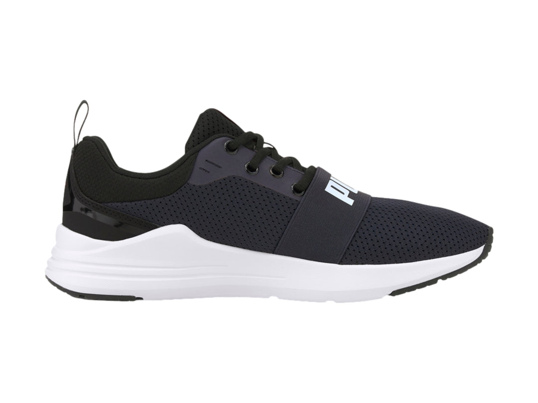 Tenis PUMA Wired Run en color azul marino con suela blanca y logotipo blanco en la parte superior.