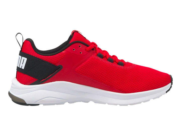 Tenis deportivos PUMA en color rojo con detalles en negro y suela blanca.