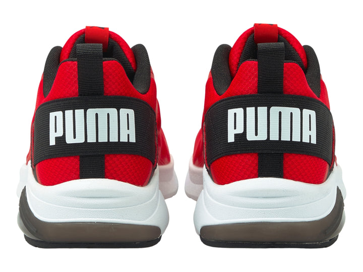 Tenis deportivos PUMA en color rojo con detalles en negro y suela blanca.
