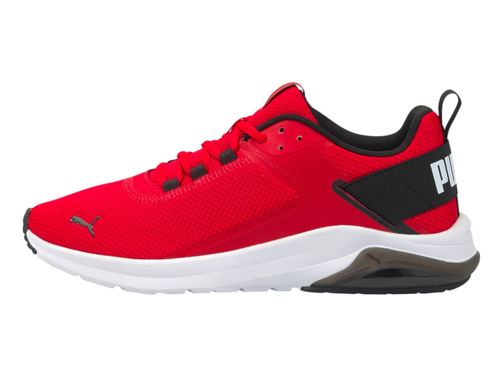 Tenis deportivos PUMA en color rojo con detalles en negro y suela blanca.
