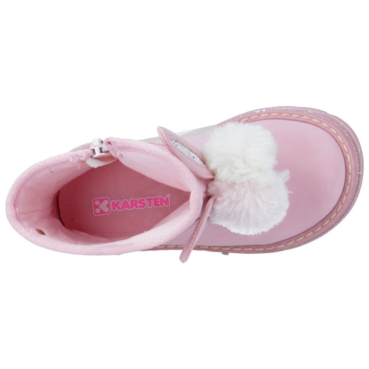 Botines color rosa para niña con pompon blanco y detalles brillantes en el lateral.