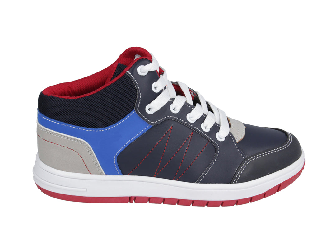 Tenis para niño Karsten color marino con detalles en azul, gris y blanco, y suela roja.