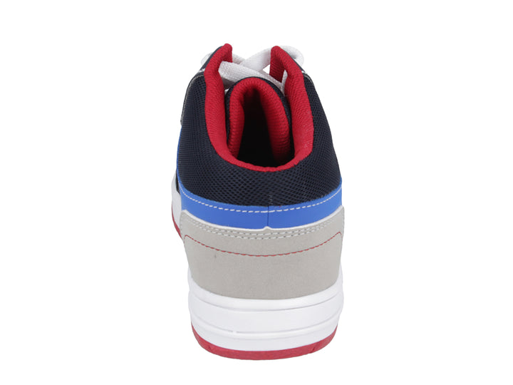 Tenis para niño Karsten color marino con detalles en azul, gris y blanco, y suela roja.