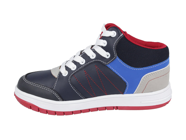 Tenis para niño Karsten color marino con detalles en azul, gris y blanco, y suela roja.