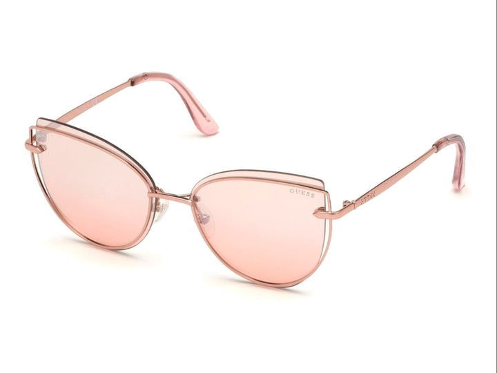 Lentes de sol GUESS modelo GU 7617 en color rosa con forma cat-eye y montura metálica brillante.