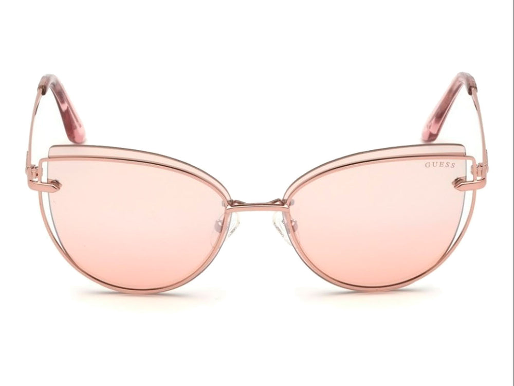 Lentes de sol GUESS modelo GU 7617 en color rosa con forma cat-eye y montura metálica brillante.
