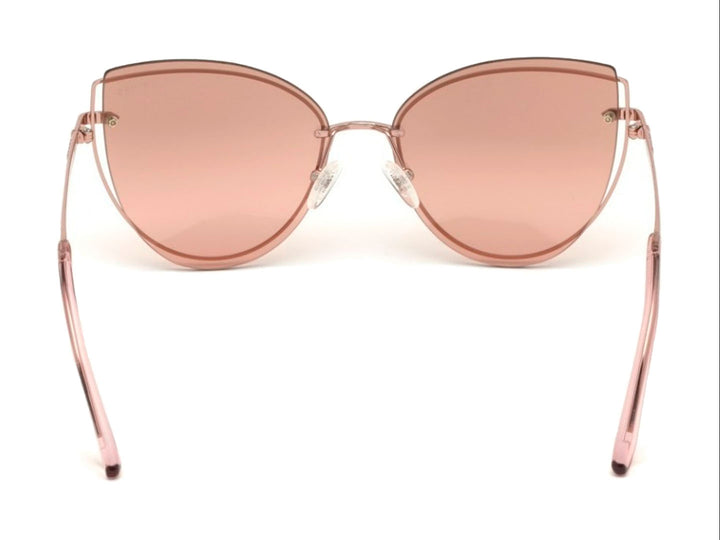 Lentes de sol GUESS modelo GU 7617 en color rosa con forma cat-eye y montura metálica brillante.