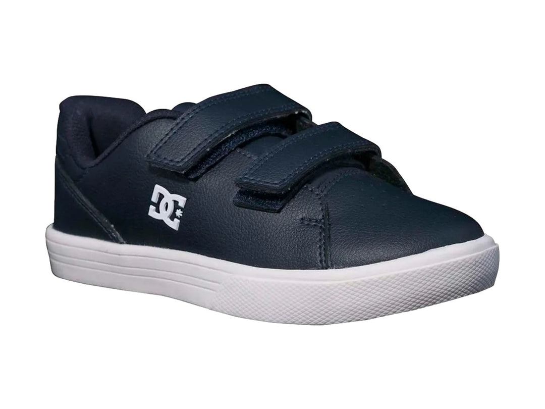 Tenis DC Shoes para niño en color azul marino con suela blanca y cierre de velcro.