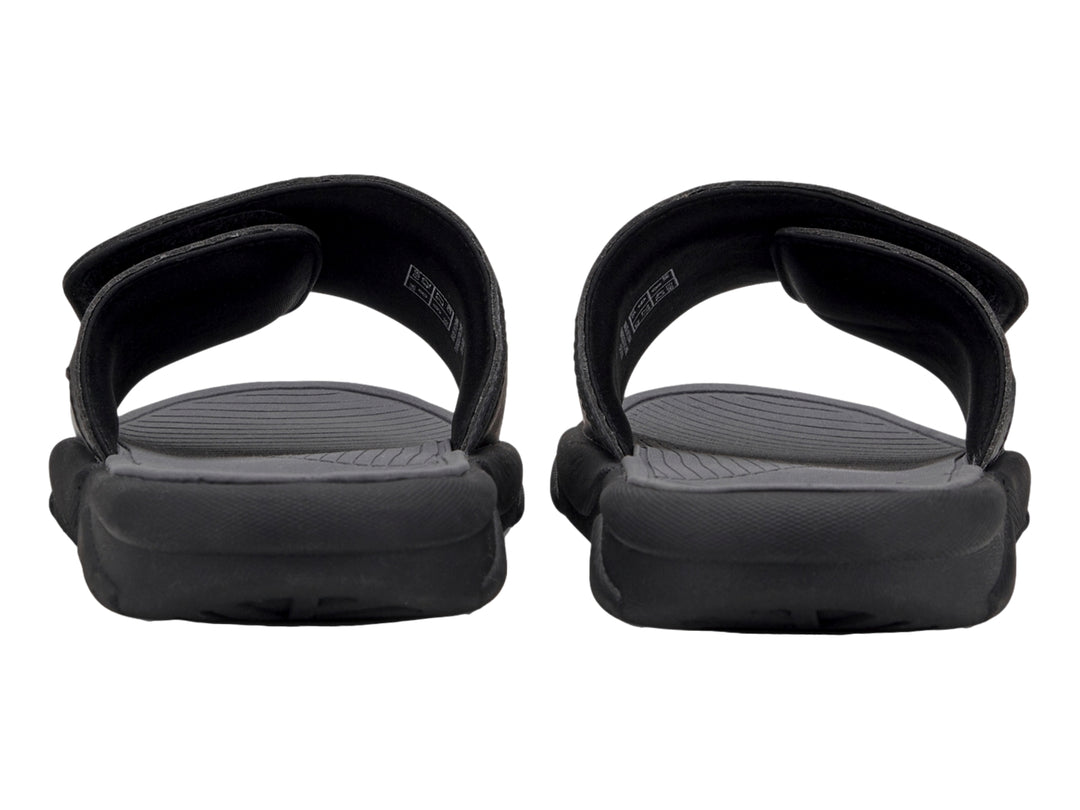 Sandalia PUMA Popcat 20 en color negro con logotipo blanco en la banda superior.