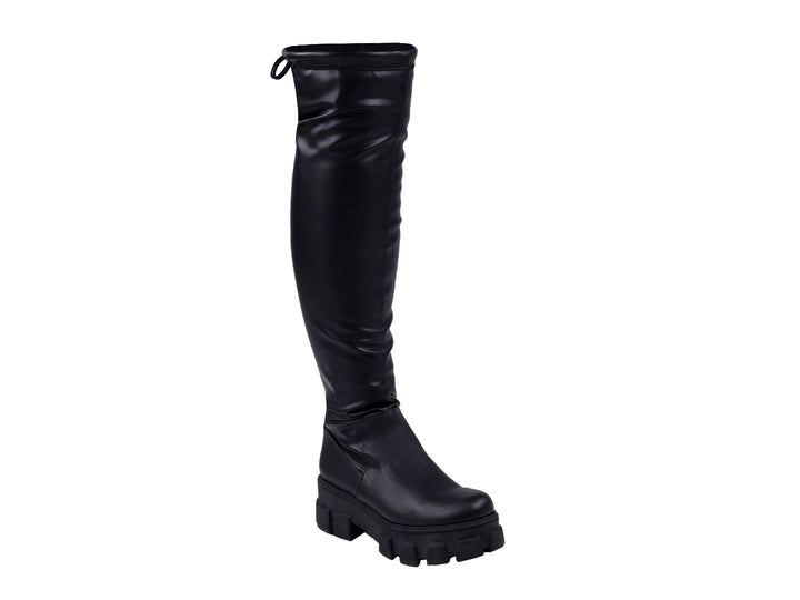 Botas altas de color negro para mujer con suela track gruesa y acabado brillante.