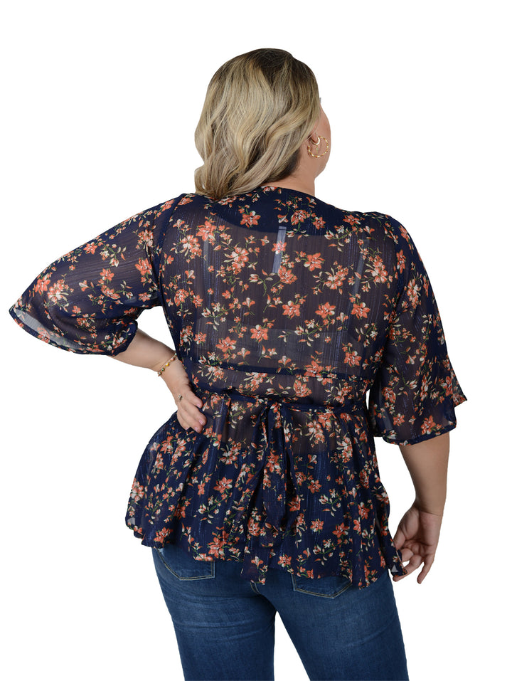 Blusa color marino con estampado floral, cuello en V y mangas cortas para mujer.