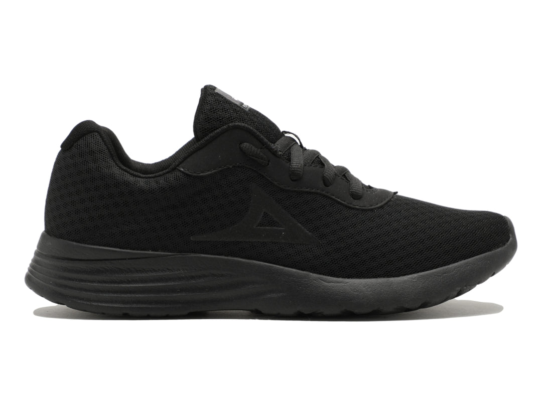 Tenis deportivos Pirma de color negro con textura de malla y suela sintética.