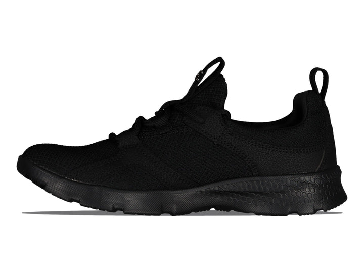 Tenis deportivo Charly color negro con tejido de malla y suela texturizada.