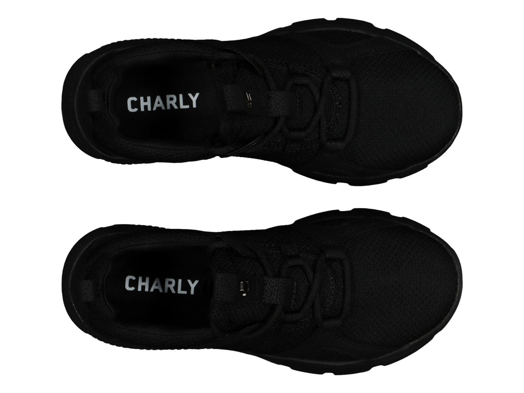 Tenis deportivo Charly color negro con tejido de malla y suela texturizada.