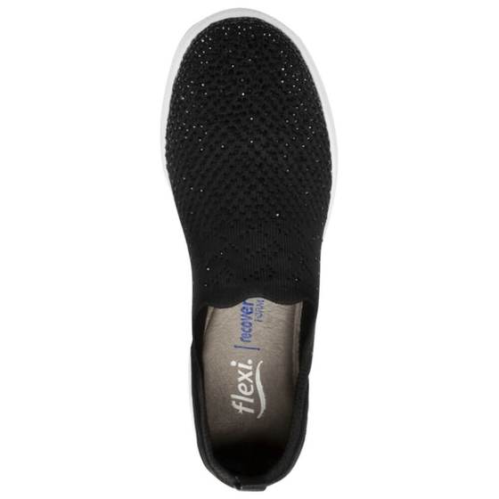 Zapato plano Flexi modelo Helga en color negro con tejido transpirable y suela blanca contrastante.