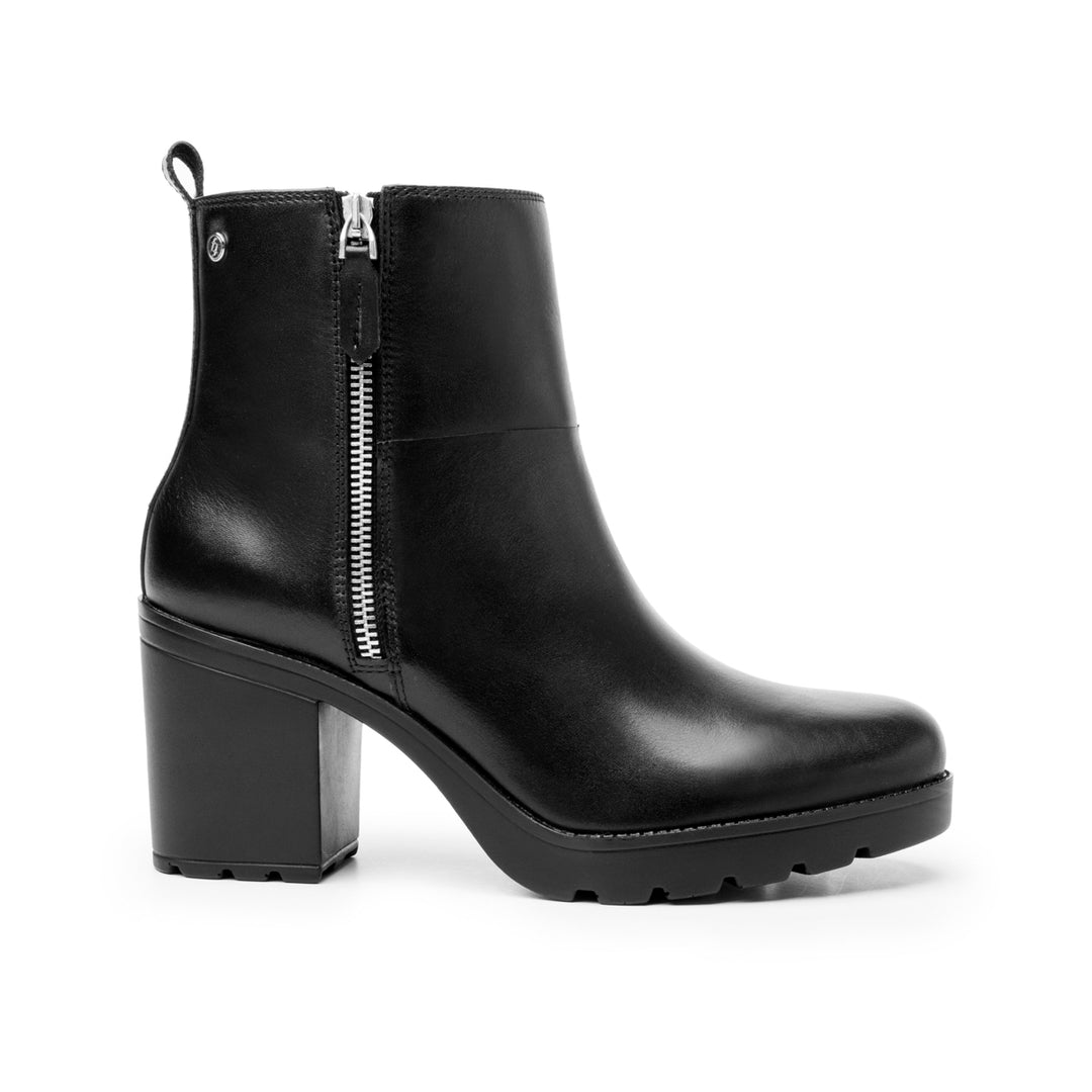Botín negro de cuero para mujer con tacón cuadrado y cierre lateral plateado.