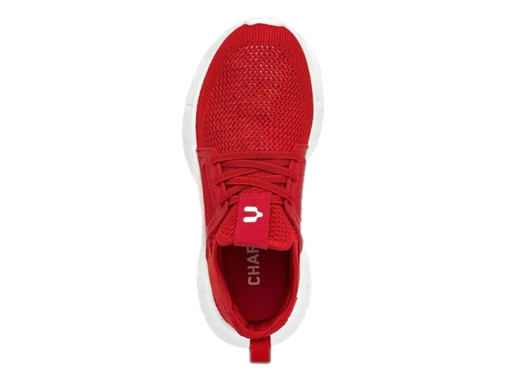 Tenis deportivos Charly de color rojo con suela blanca y parte superior de malla transpirable.