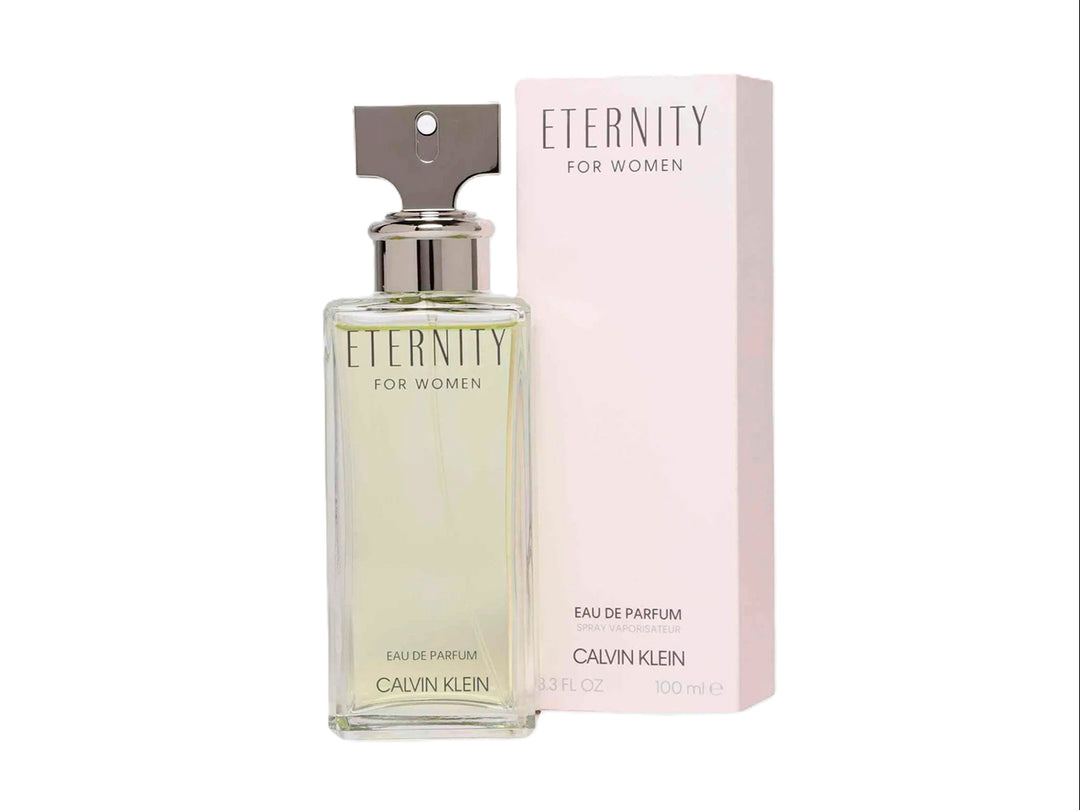 Frasco de perfume Calvin Klein Eternity for Women con su caja en color rosa pálido y blanco.