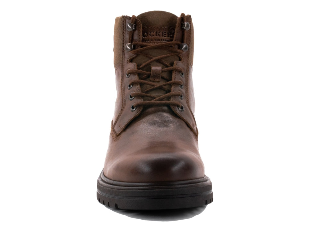 Bota de cuero marrón con suela gruesa negra y cordones.