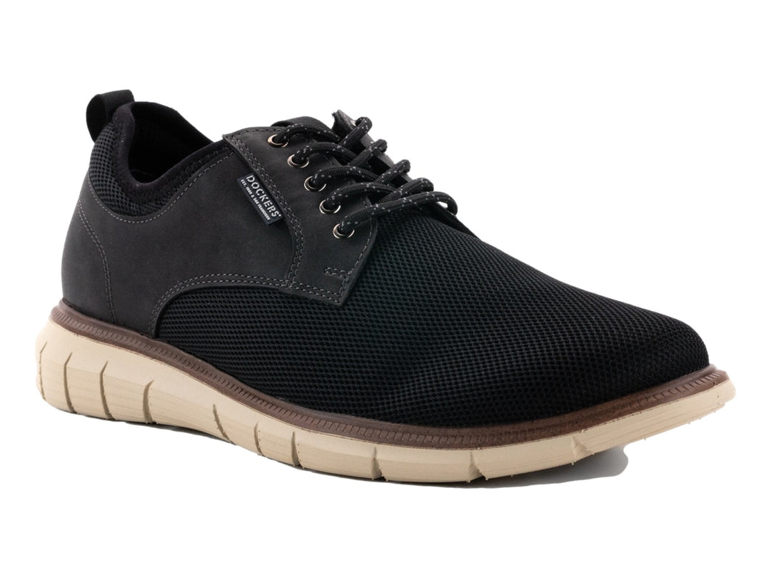 Zapato casual Dockers color negro con suela beige y cordones.
