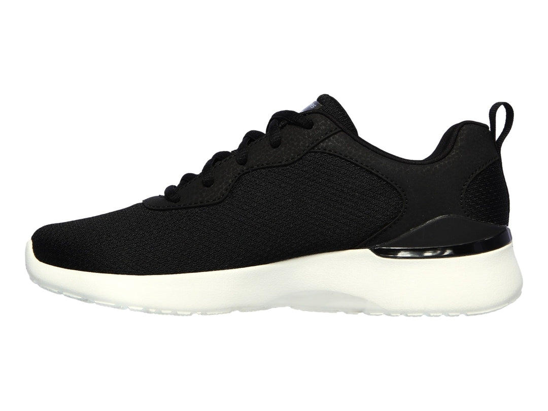 Tenis deportivos Skechers para mujer en color negro con suela blanca.