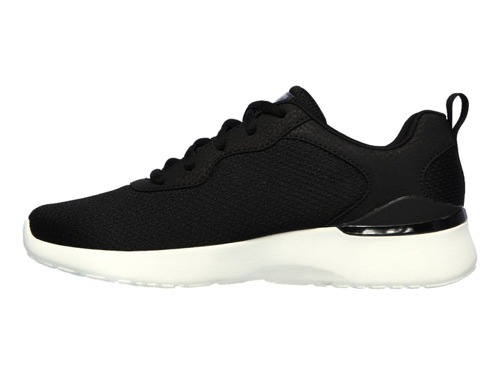 Tenis deportivos Skechers para mujer en color negro con suela blanca.