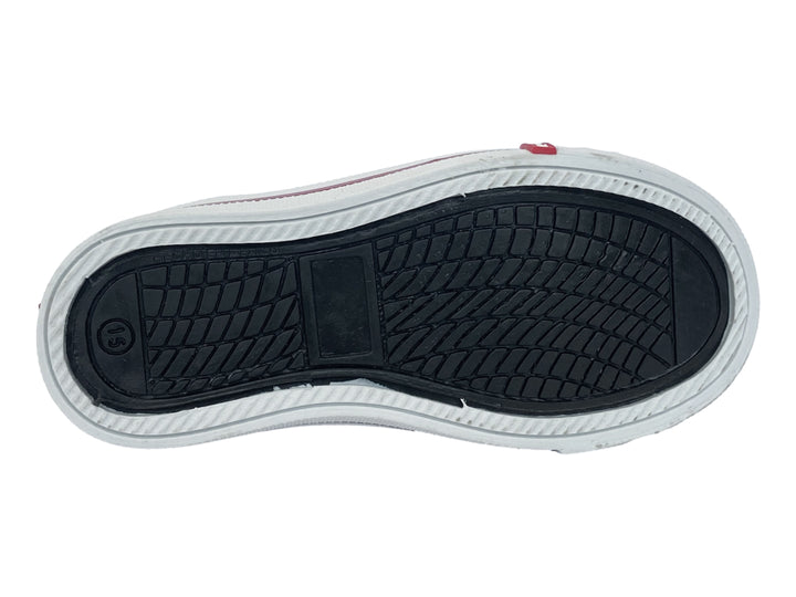Tenis infantiles de lona color negro con punta y suela blanca.