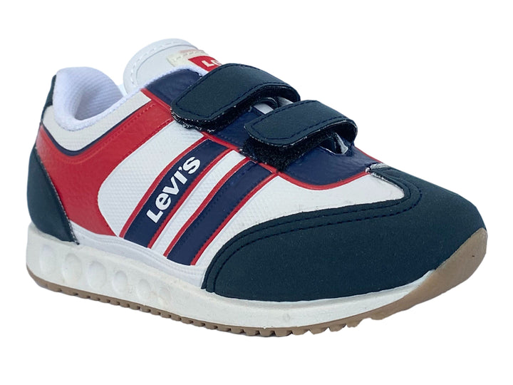Tenis infantiles en colores blanco, azul y rojo con cierres de velcro.