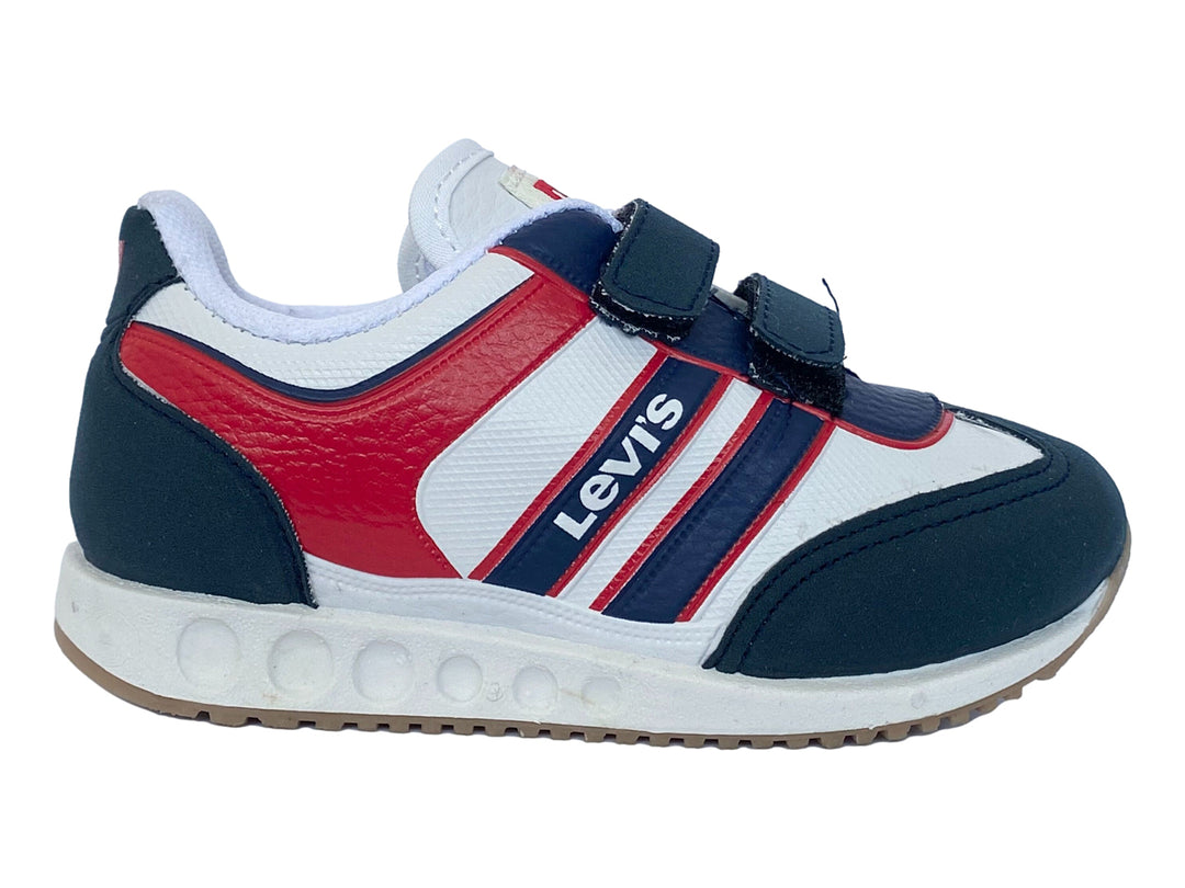 Tenis infantiles en colores blanco, azul y rojo con cierres de velcro.