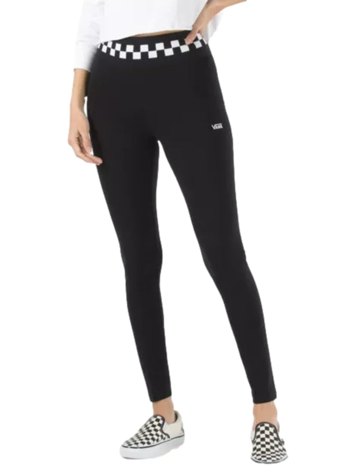 Leggings negros de Vans con cintura a cuadros blancos y negros.