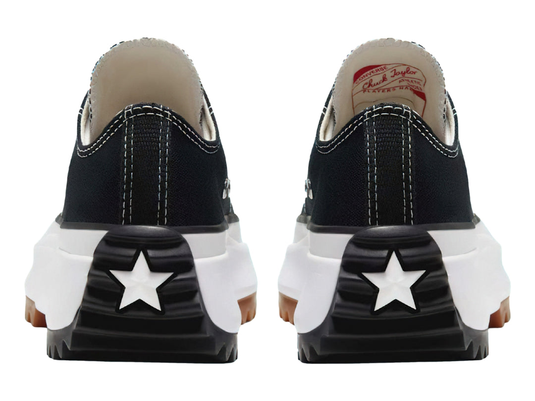 Tenis Converse Run Star Hike Ox en color negro con suela de plataforma blanca y base dentada en color goma.