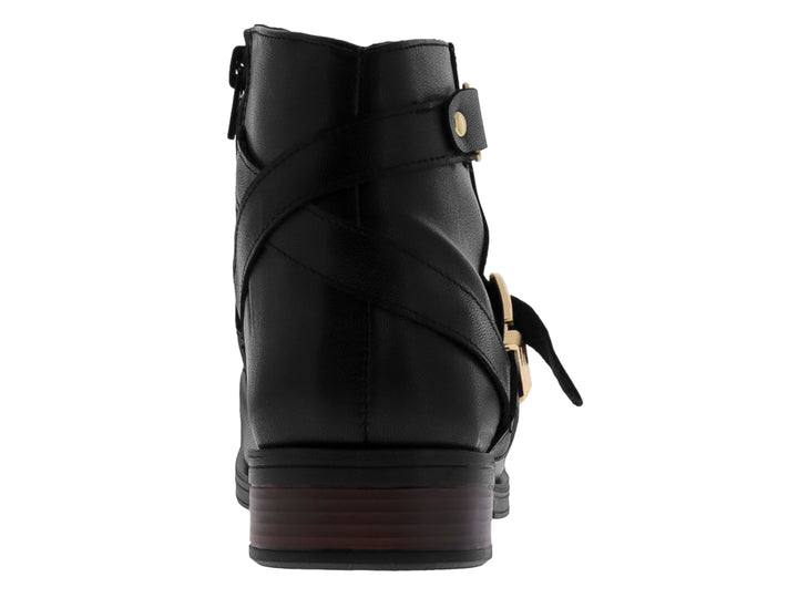 Botín casual color negro para Mujer con detalles de hebillas doradas y tacón bajo.