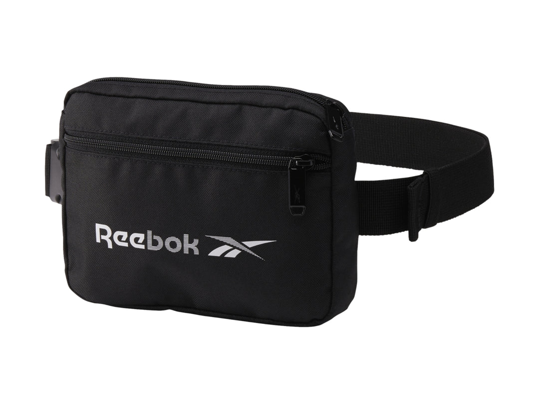 Cangurera deportiva Reebok color negro con logotipo blanco frontal y correa ajustable.
