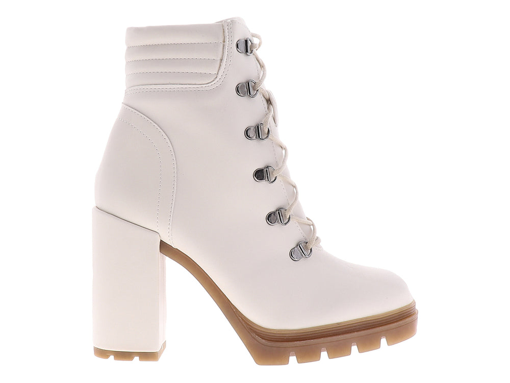 Botines color beige para mujer con tacón cuadrado, plataforma y cordones frontales.