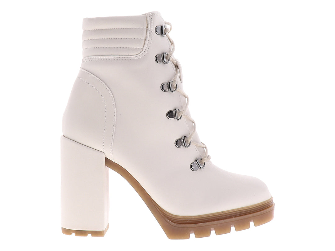 Botines color beige para mujer con tacón cuadrado, plataforma y cordones frontales.