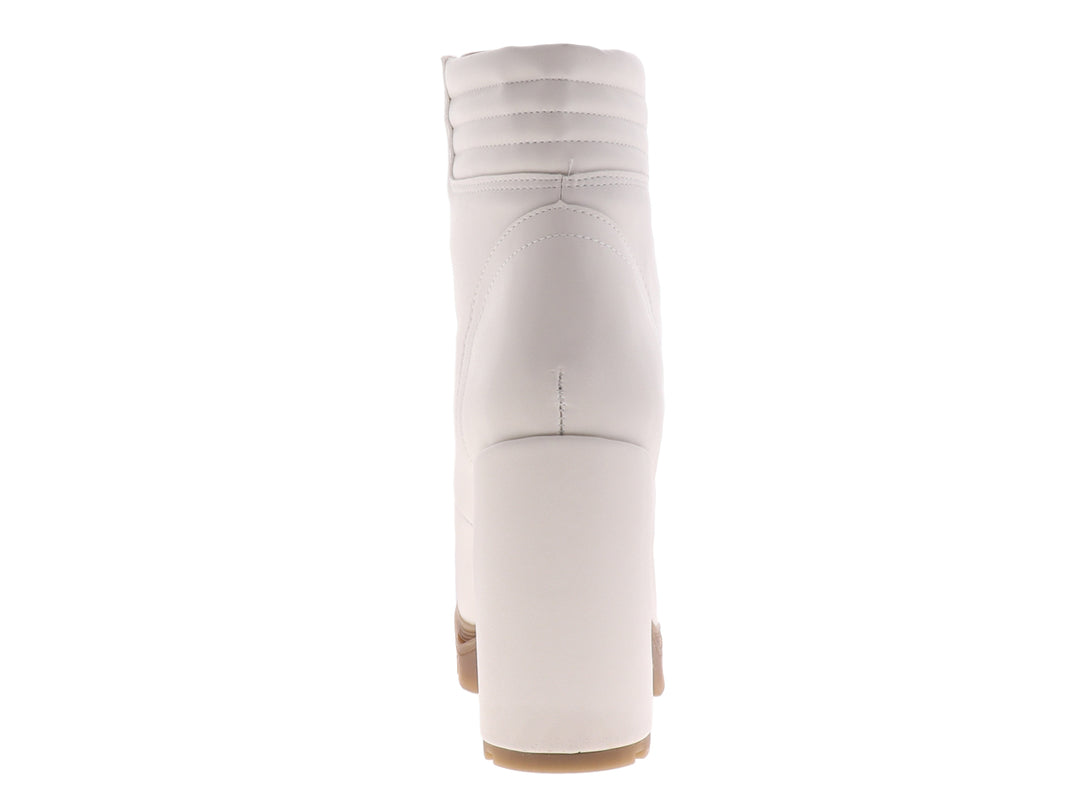 Botines color beige para mujer con tacón cuadrado, plataforma y cordones frontales.