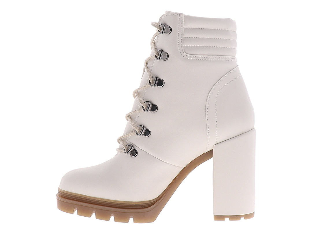 Botines color beige para mujer con tacón cuadrado, plataforma y cordones frontales.