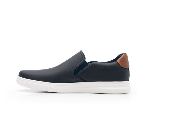 Tenis Flexi Griezman para hombre en color navy con suela blanca y diseño slip-on.