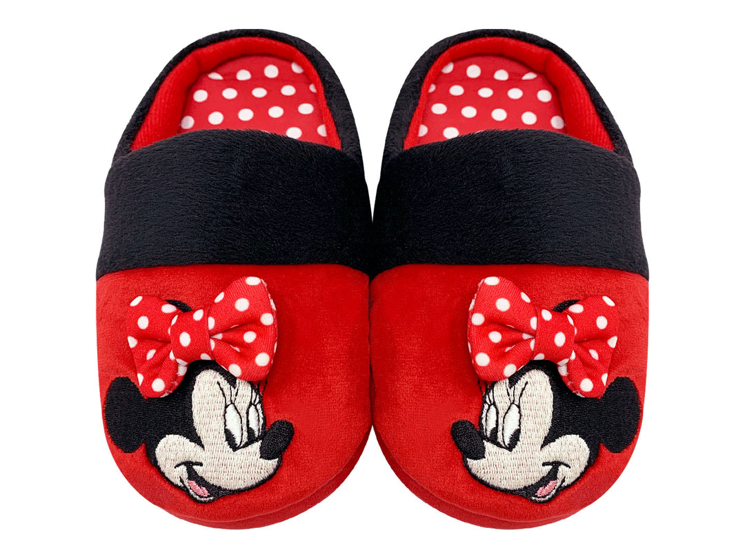 Pantuflas rojas y negras de Minnie Mouse para niña con un moño decorativo.