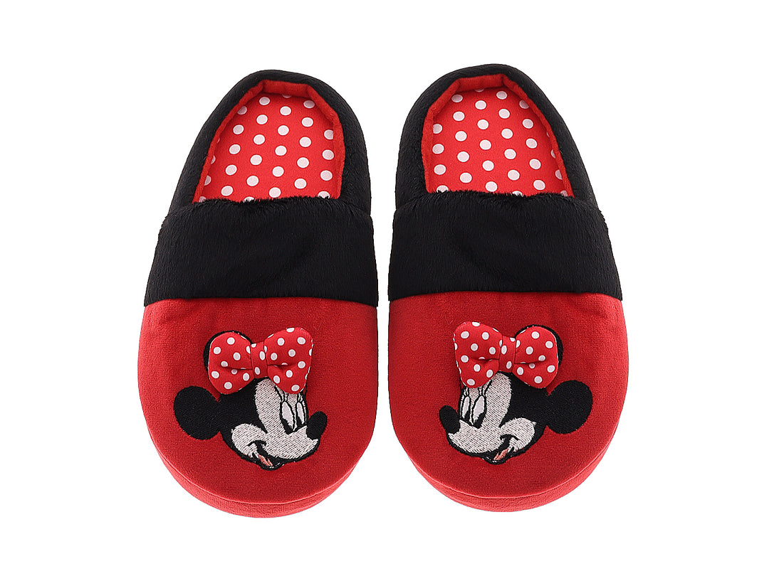 Pantuflas rojas y negras de Minnie Mouse para niña con un moño decorativo.