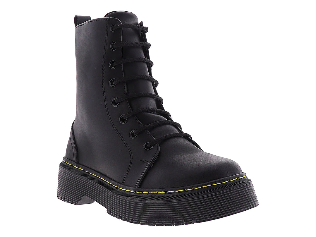 Botines negros para mujer con plataforma y costuras amarillas contrastantes.
