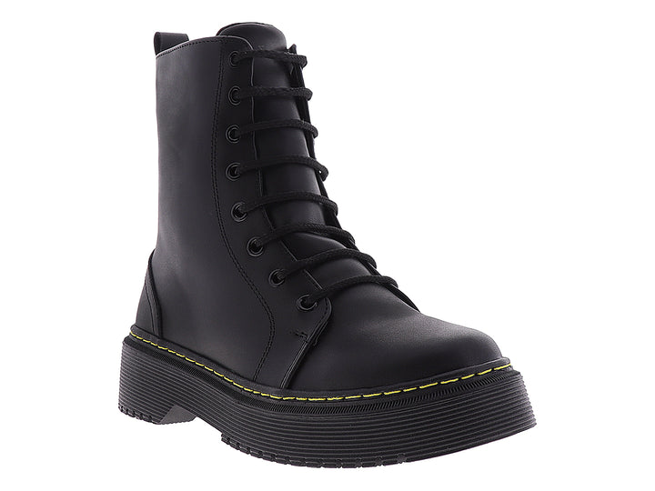 Botines negros para mujer con plataforma y costuras amarillas contrastantes.