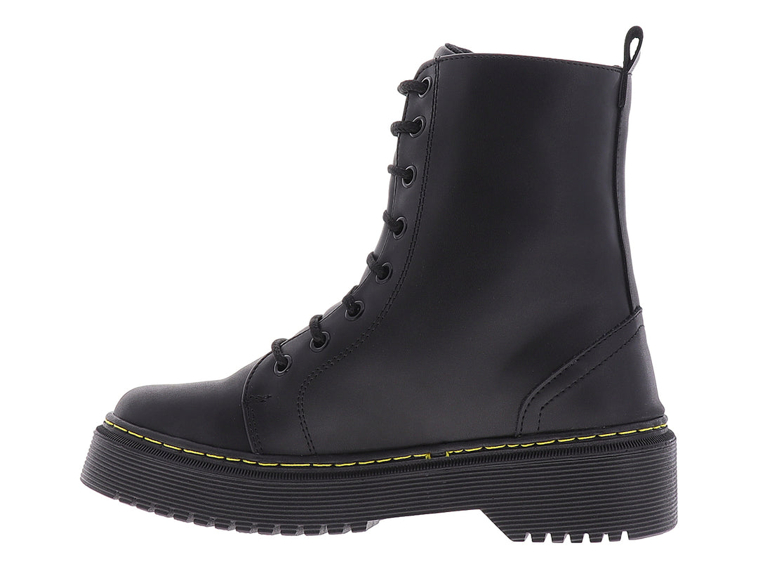 Botines negros para mujer con plataforma y costuras amarillas contrastantes.