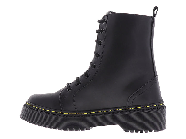 Botines negros para mujer con plataforma y costuras amarillas contrastantes.