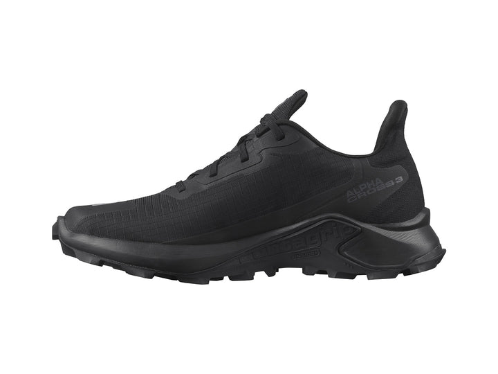 Tenis deportivos Salomon Alphacross 3 color negro con suela robusta y detalle rojo.
