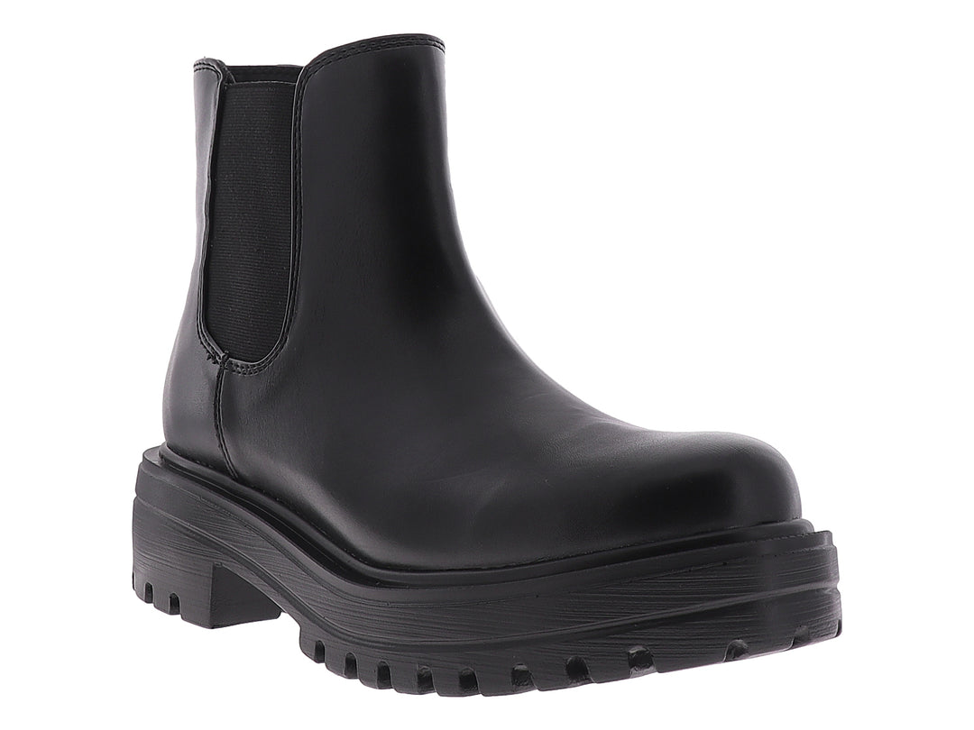 Botín negro de cuero estilo Chelsea con suela track gruesa y plataforma.