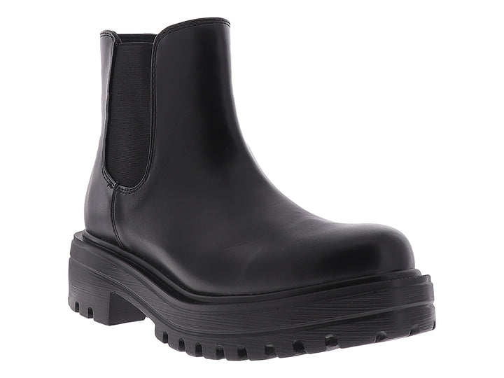 Botín negro de cuero estilo Chelsea con suela track gruesa y plataforma.