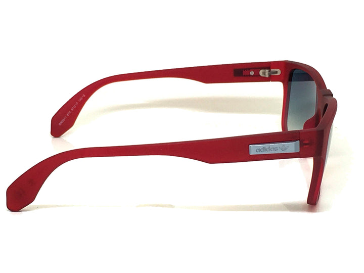 Lentes de sol Adidas Originals color rojo con cristales azules degradados y montura rectangular mate.