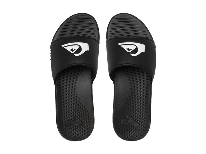Sandalia tipo slide de color negro con logotipo de Quiksilver en blanco.